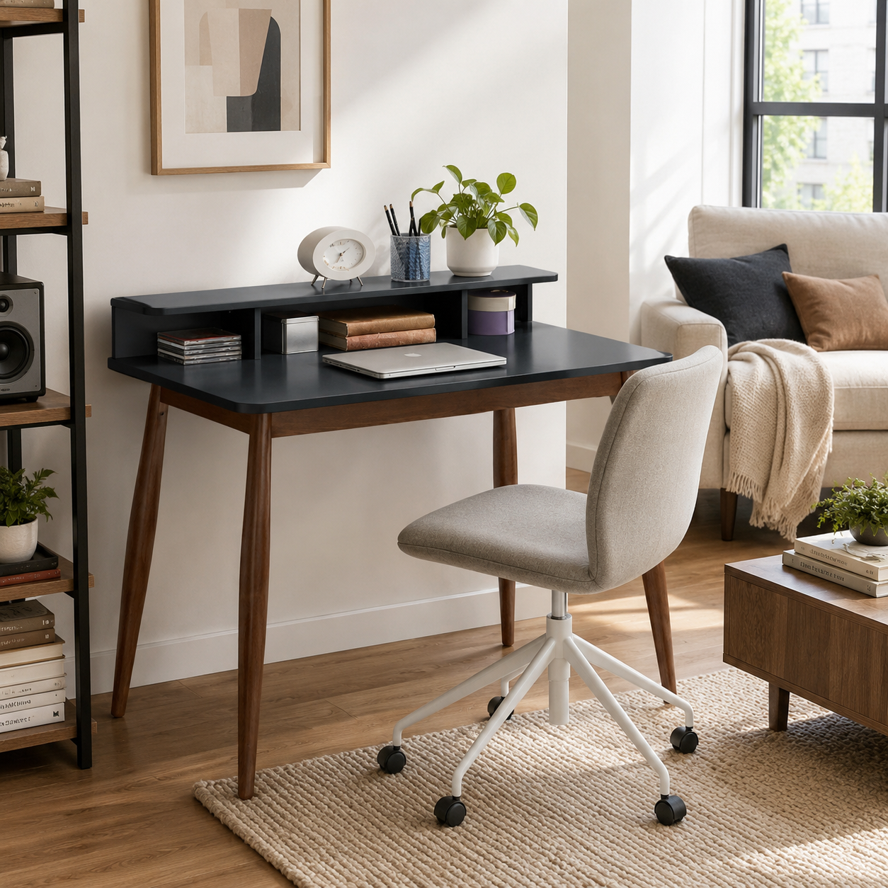 Visby grey writing desk showing an open hutch workspace with a rolling chair near a bed