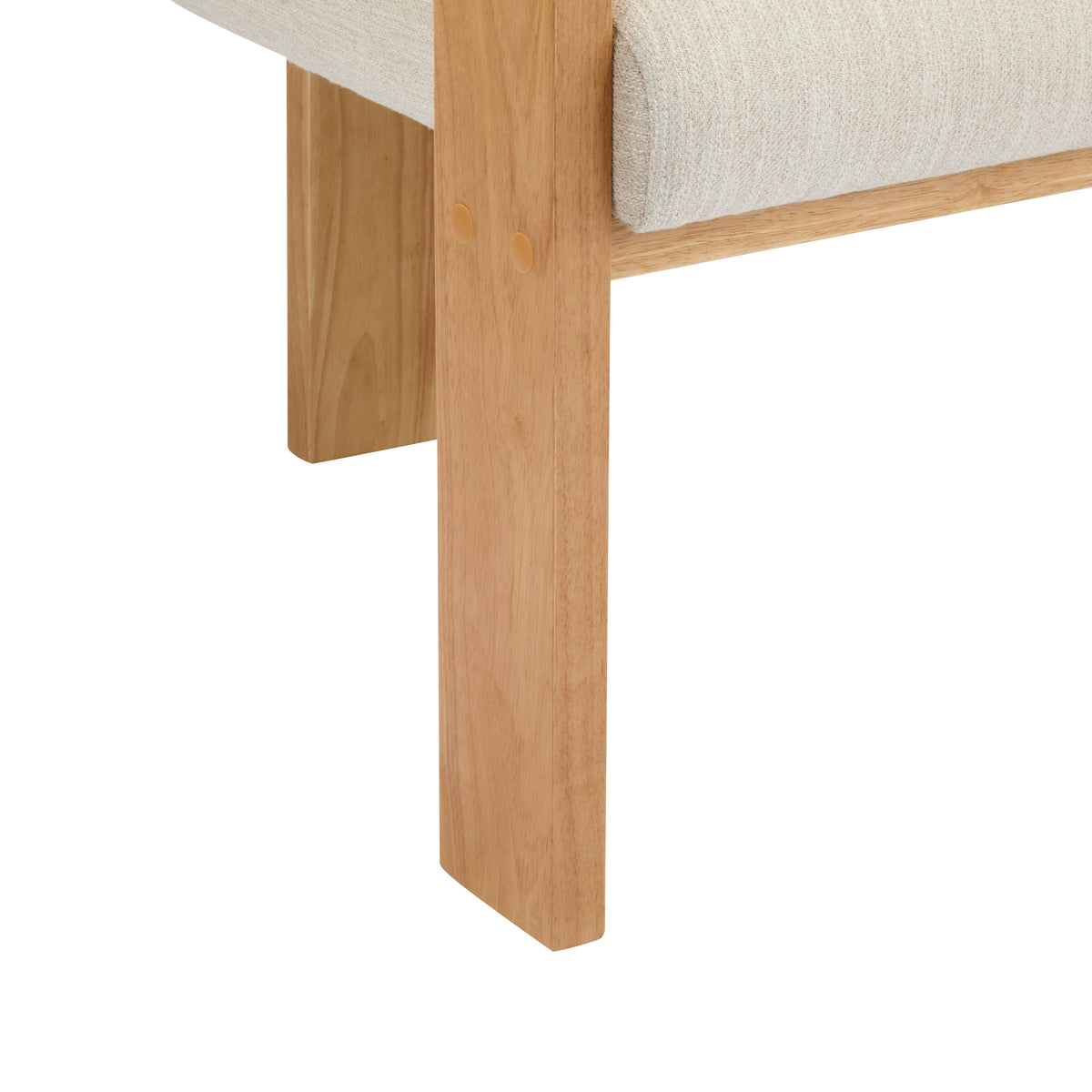 Wakatipu natural dining armchair close-up of the lower wood frame and front leg detail