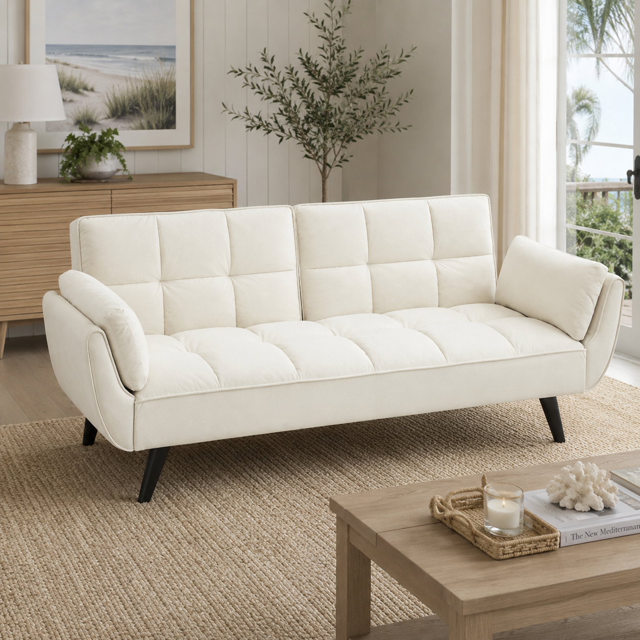 Wellington white upholstered futon sofa bed in a bright modern interior