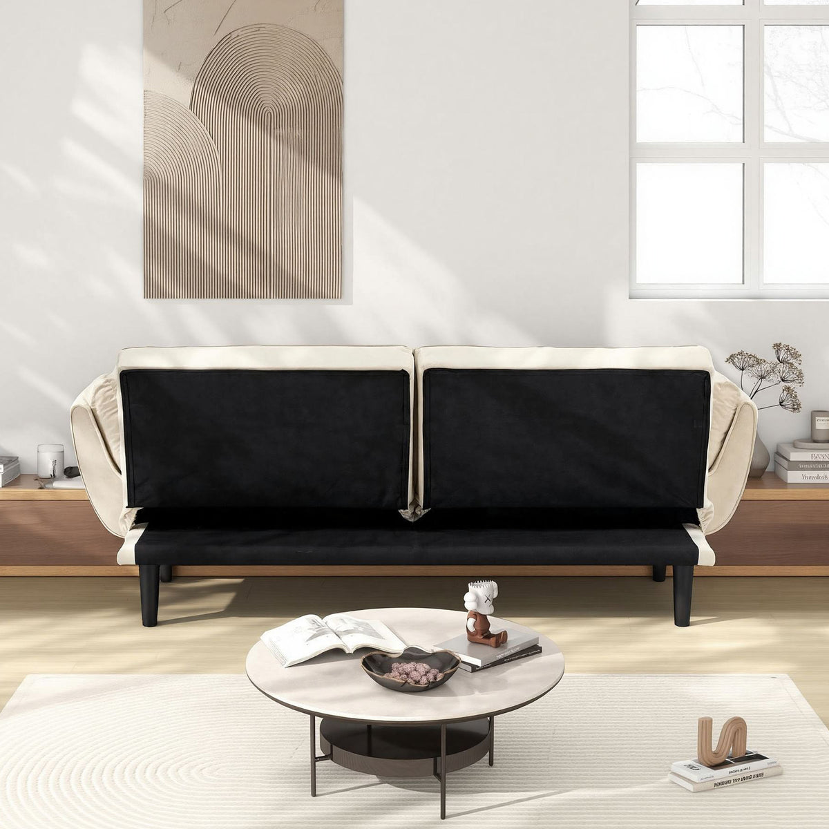 Wellington white futon sofa bed with adjustable backrest in a styled room setting