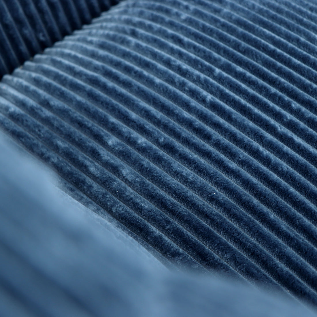 Westwood blue bean bag armchair showing corduroy upholstery texture detail
