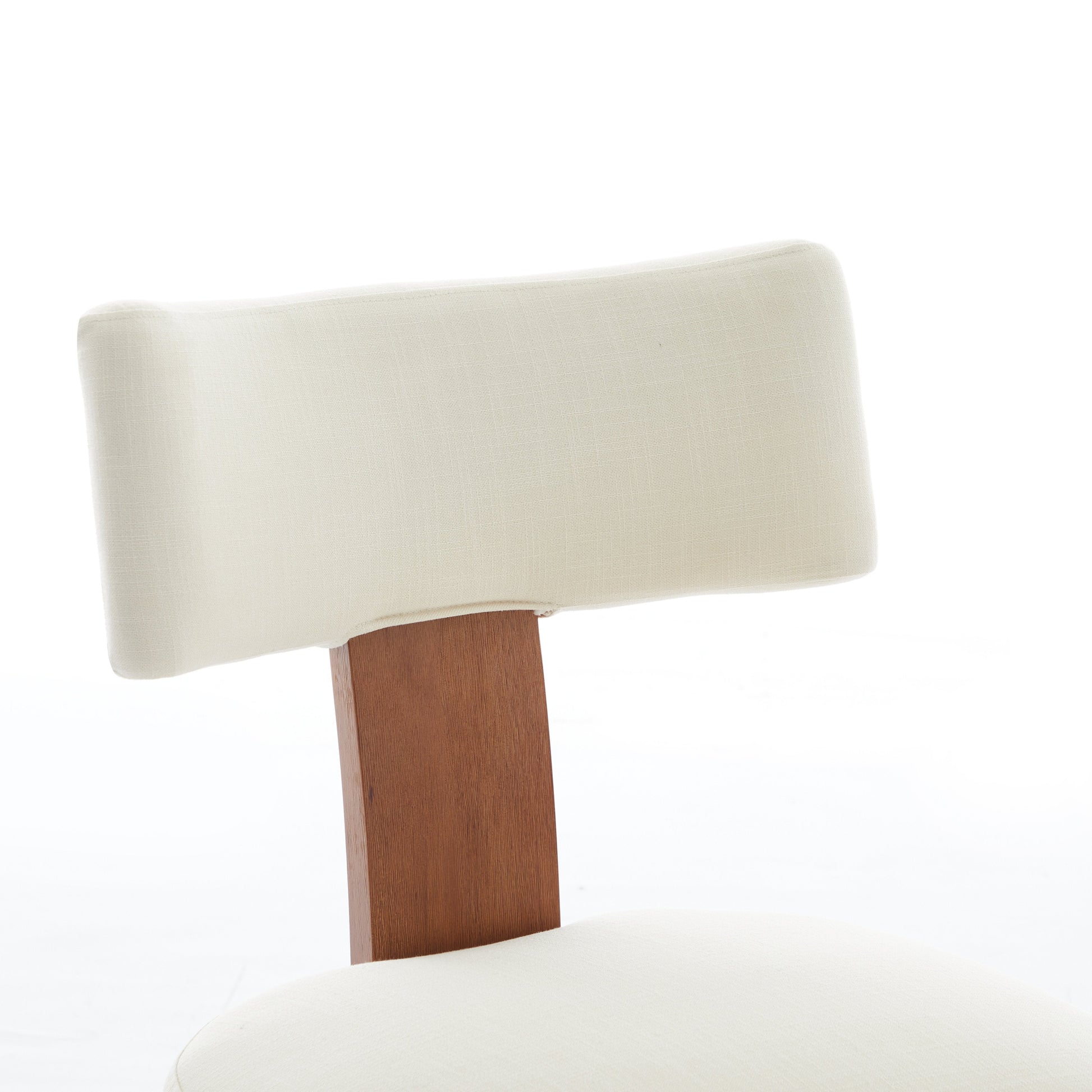 Yukon white linen dining chair close-up of the upholstered seat and curved backrest