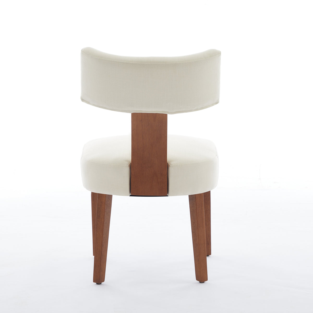 Yukon white dining chair rear view showing the curved upholstered backrest on white background