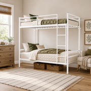 Zorven white bunk bed showing a twin over twin setup with guardrails in a bright neutral bedroom
